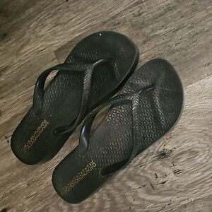 Black wedge flip flops